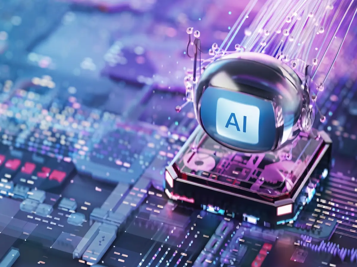 An AI processor chip on a circuit board with fibre-optic strands and a glass lens marked AI - the AI agents for business Silex builds and runs